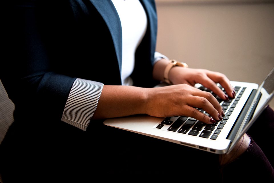 Person Using Macbook Air
