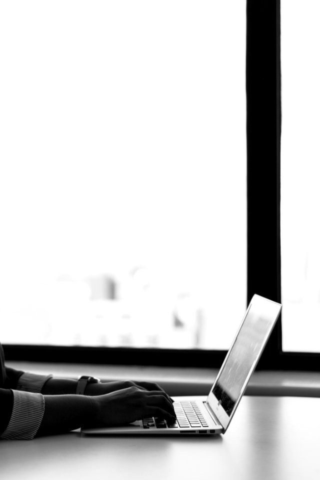 Gray Laptop Computer On White Surface