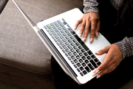 Person Using Silver Macbook photo