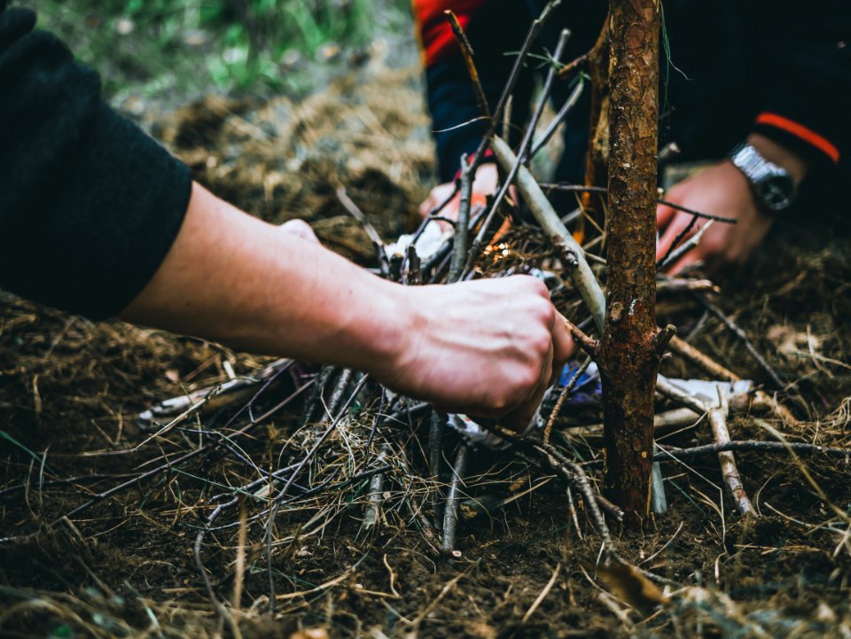 Two People Making Fire
