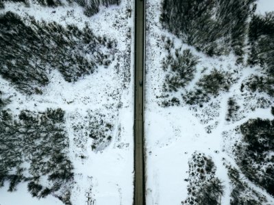Aerial Photo Of Gray Concrete Road During Winter photo