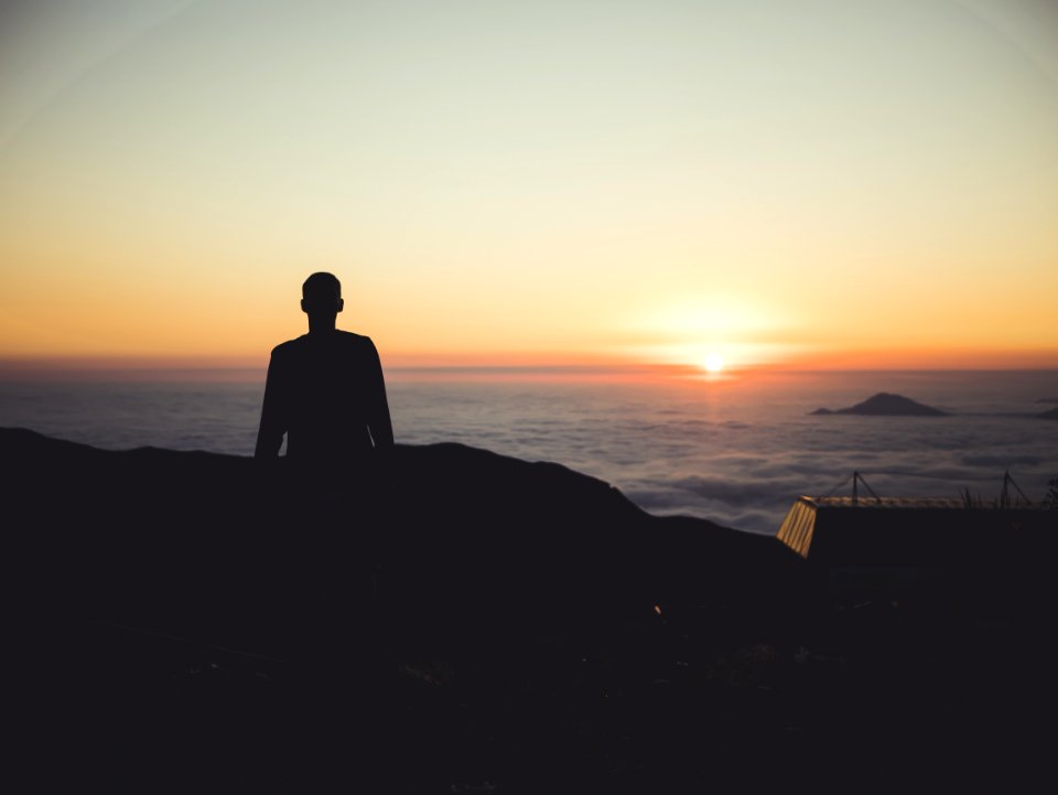 Silhouette Of Person During Dawn