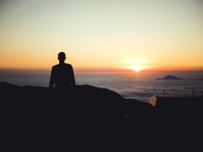 Silhouette Of Person During Dawn photo