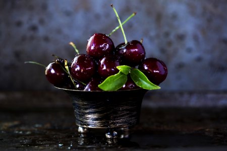 Red Cherries On Stainless Steel Bowl photo