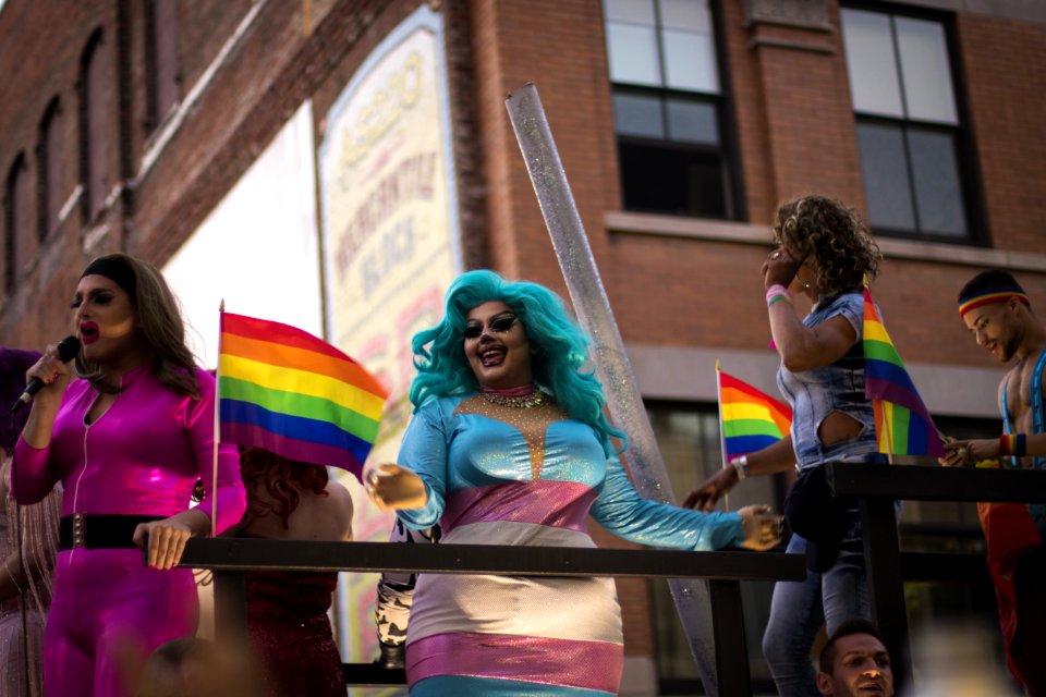 Photo Of Person Holding Lgbt Flag photo