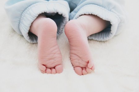Close-up Photography Of Babys Feet photo