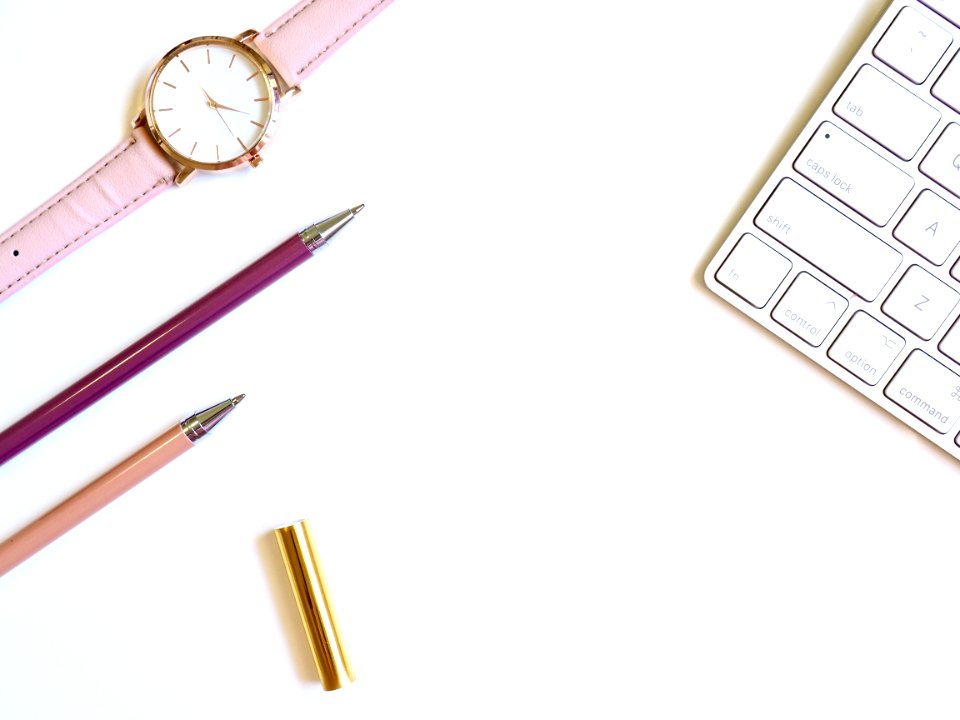 Round Gold-colored Watch And Two Pens