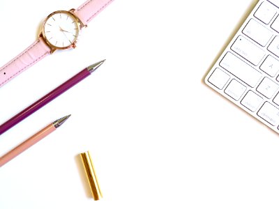 Round Gold-colored Watch And Two Pens
