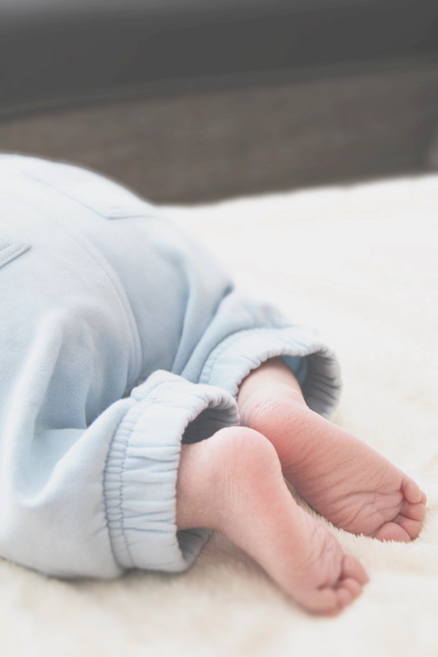 Baby Wearing Grey Pants