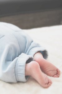 Baby Wearing Grey Pants photo