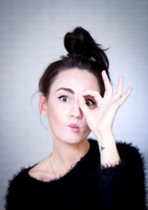 Woman In Black Fur Top