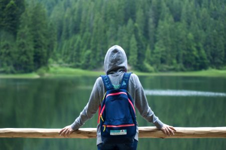 Person Wearing Gray Hoodie Jacket Watching Lake photo