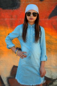 Girl Wearing Blue Chambray Dress Wearing Sunglasses photo
