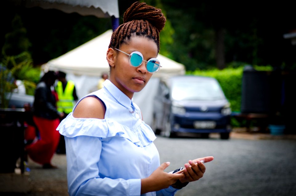 Selective Focus Photo Of Woman Holding Android Smartphone