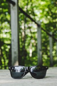 Selective Focus Photography Of Black Framed Sunglasses photo