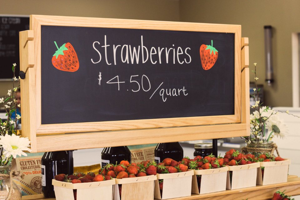 Strawberries For 450 Per Quartz Signage Above Bunch Of Strawberries