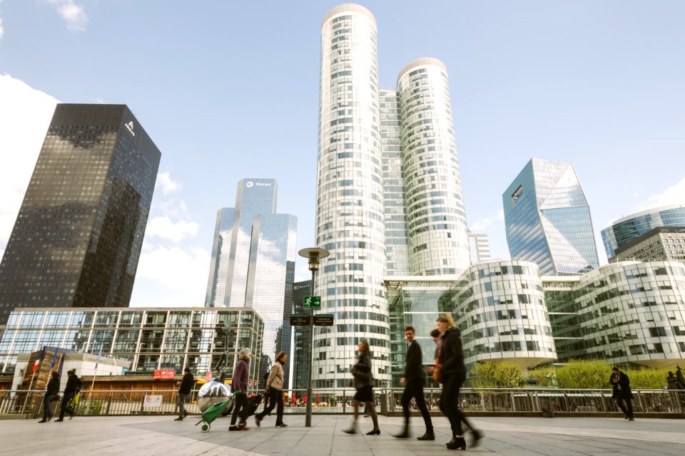 People Walking Near High Rise Buildings photo