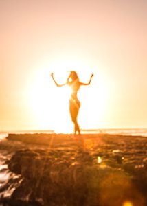 Silhouette Of Woman Near Cliff photo