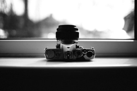 Grayscale Photo Of Gray Mirrorless Camera photo