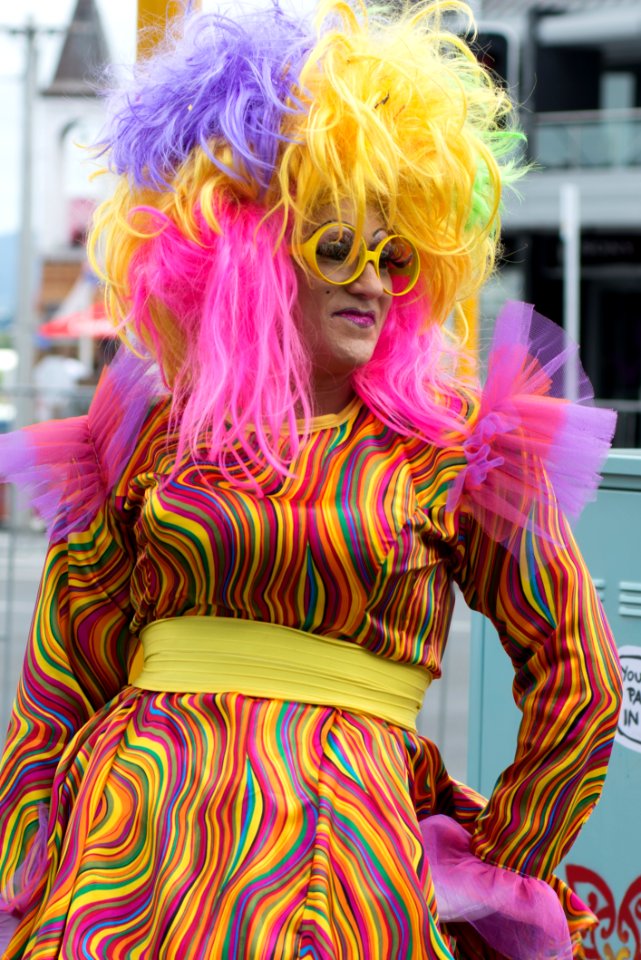 Person Wearing Yellow Pink And Purple Hair Witg