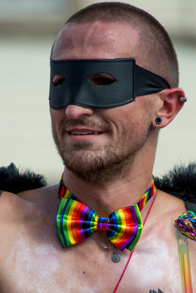 Man Wears Black Mask