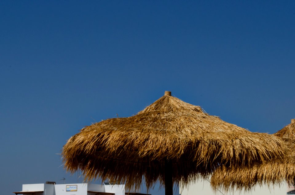 Brown Hut Under Clear Sky