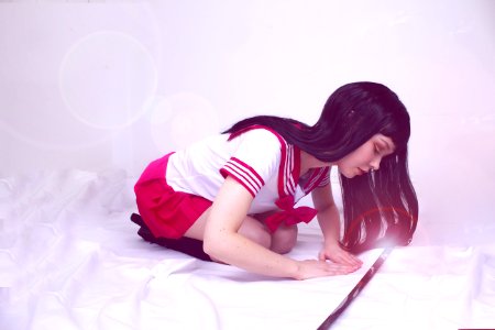 Woman In Student Uniform Looking On Wand