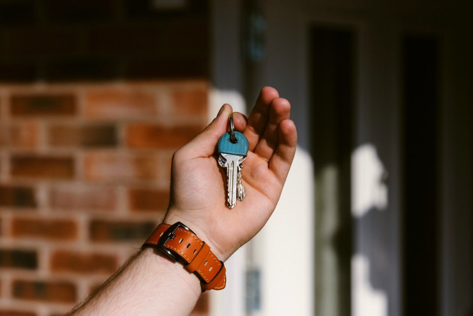 Person Holding Silver Keys