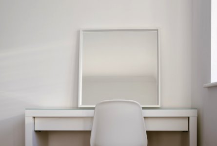 Chair In Front Of Desk With Mirror On Top photo