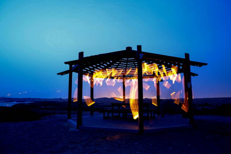 Brown Wooden Gazebo Near Sea