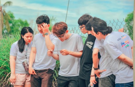 Five Men And 1 Women Wearing Crew-neck T-shirts At Daytime photo