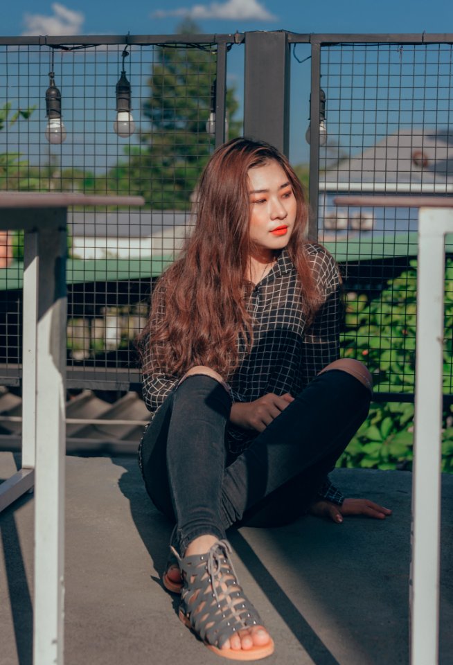 Woman Sitting In The Floor