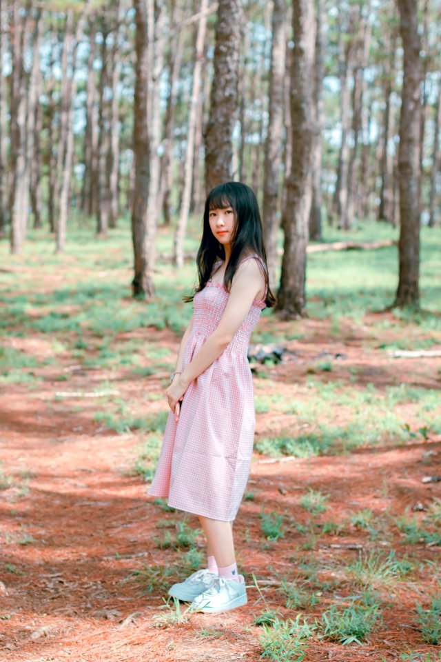 Woman Wearing Pink Sleeveless Dress