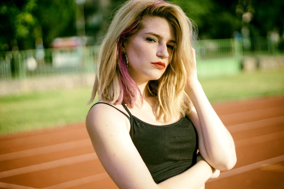 Woman Wearing Dark-green Spaghetti Strap Top
