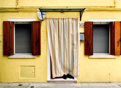 White And Brown Curtain On Yellow Wall