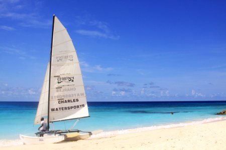 Sailboat Sail Coastal And Oceanic Landforms Sky photo