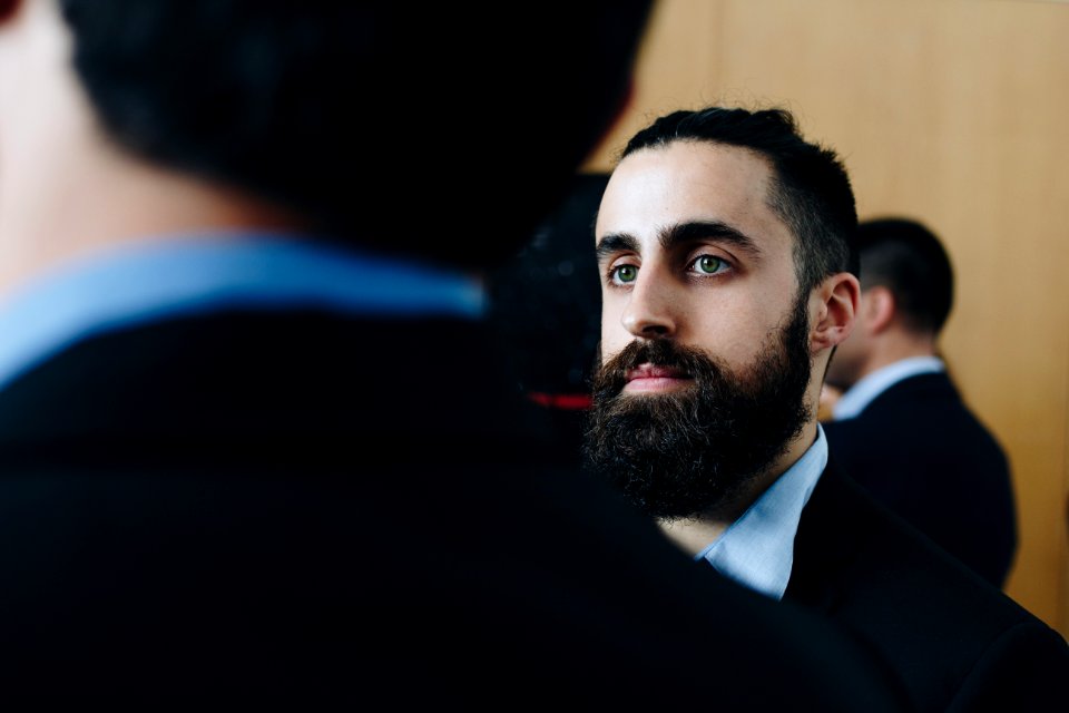 Man Wearing Black And Blue Suit