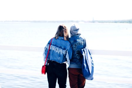 Two People Looking At The Beach photo