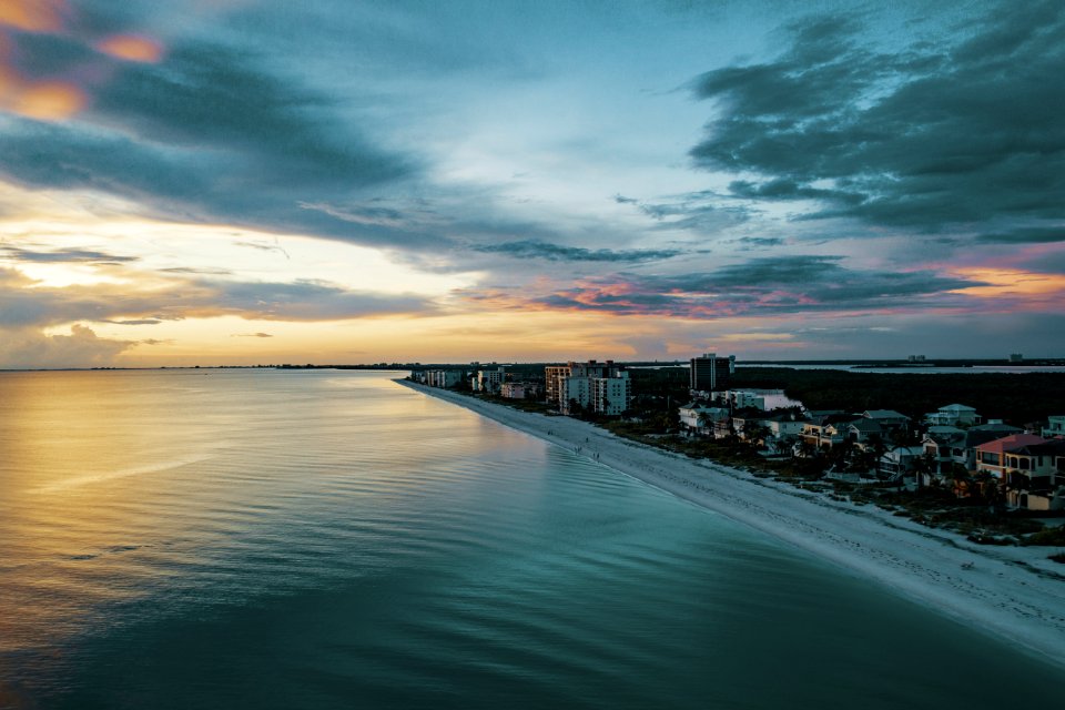 Beach Buildings Clouds