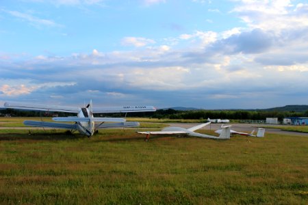 Airplane Aircraft Field Sky photo