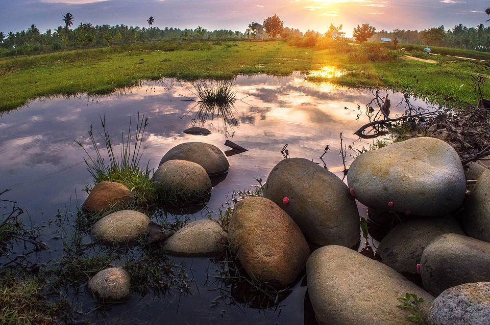 Pond stone sunset