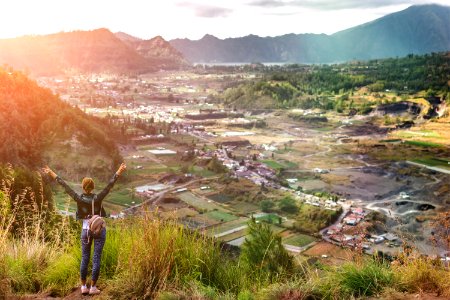 Woman Sstanding On Mountain In Morning Bali Island photo