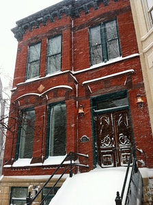 Snow snowing building