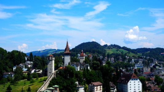 Sky, Mountainous Landforms, City, Mountain Range photo