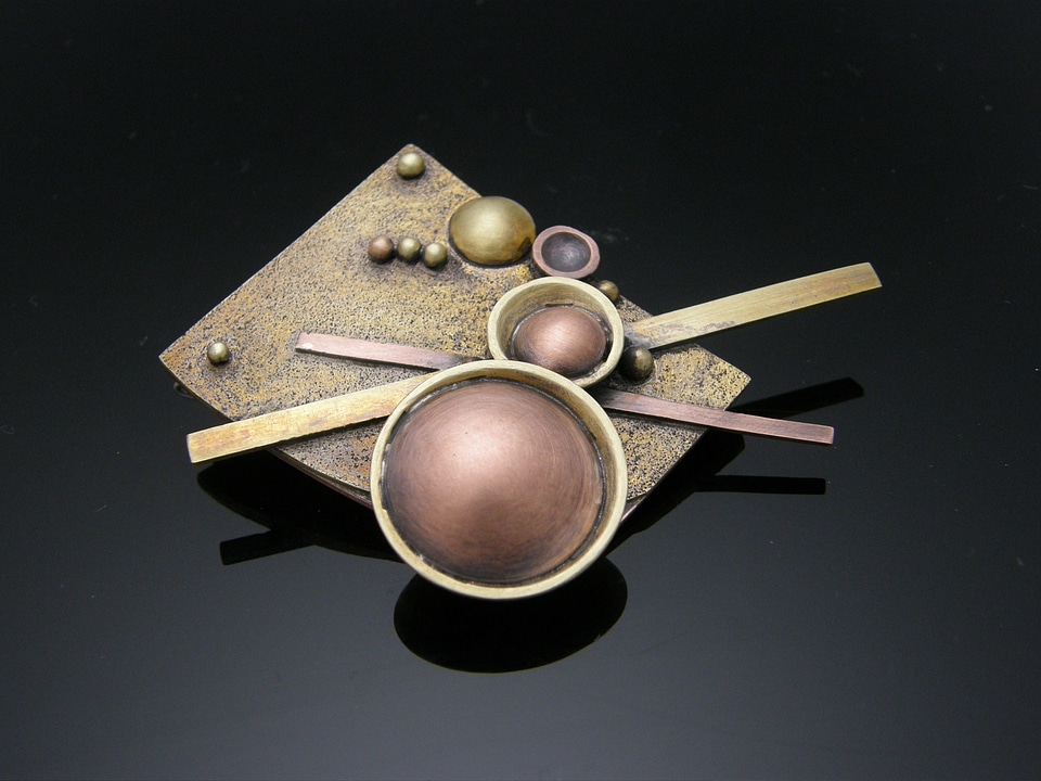 Brass brooch ball work