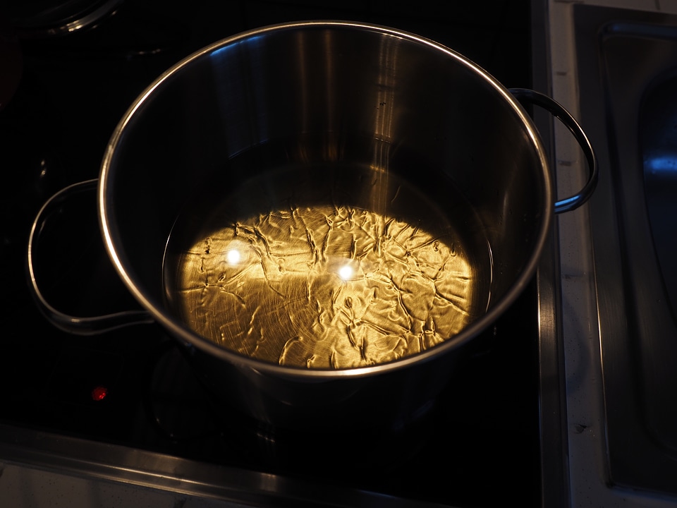 Heating sunflower oil bring to a boil