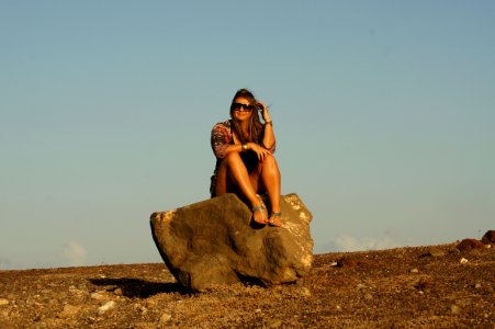 Rock Sky Sitting Girl photo