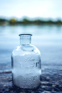 Clear Glass Jar In Body Of Water photo