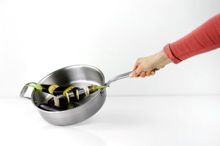 Person Holding Stainless Steel Casserole