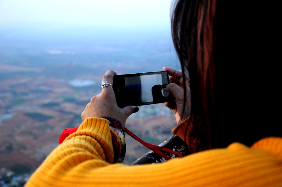 Photo Of Woman Taking Picture